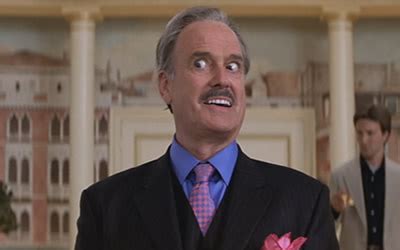 John Cleese as Donald P. Sinclair in Rat Race