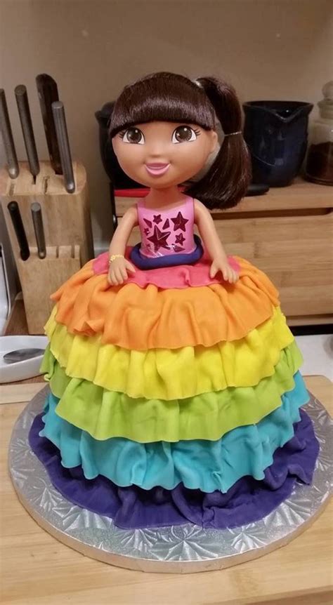 Dora Doll Fondant Ruffled Rainbow Cake - CakeCentral.com