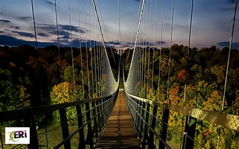 Designed and built by ERi...SkyBridge MI: the world's longest timber-towered suspension bridge ...