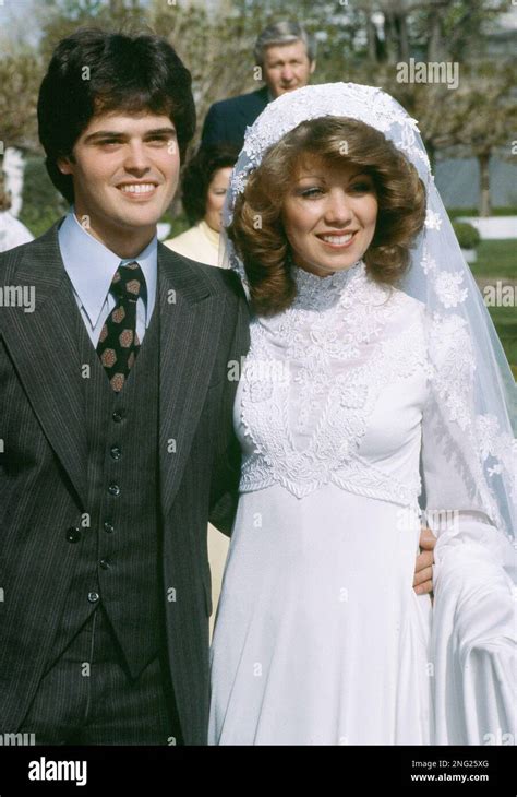 Pop singer Donny Osmond is seen with his new bride Debra Glenn after their wedding in Salt Lake ...