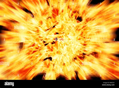 orange fire blast on black background Stock Photo - Alamy