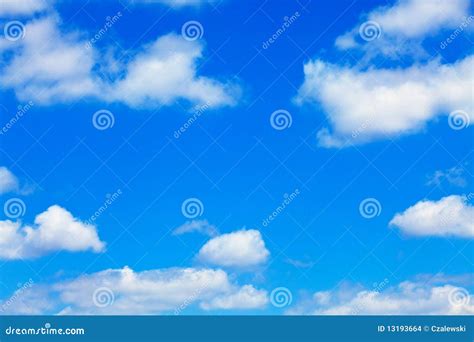 Blue Sky with White Fluffy Clouds Stock Photo - Image of clouds, white ...