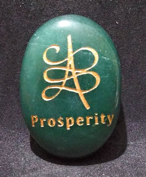 ZIBU symbol engraving on crystal pebble : For Prosperity