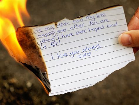 Breakup Feminine Hand Holds Burning Love Letter Stock Photo - Download ...