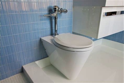 The miniLoo Toilet incorporates an exceptionally clean and compact ...