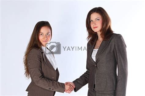 Royalty Free Image | Business women shaking hands by korvin79