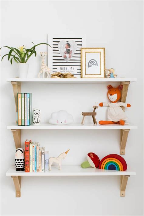 A Tiny Nursery with Huge Style | Kids room shelves, Nursery shelves ...