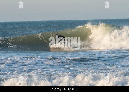 Surfer at Polzeath in North Cornwall Stock Photo - Alamy