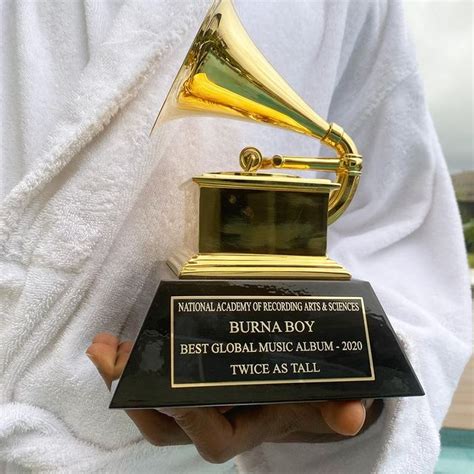 Burna Boy receives GRAMMY trophy - GRUNGECAKE™