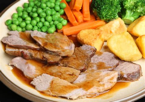 Sunday Roast Lamb Dinner stock image. Image of meal, roast - 33623663
