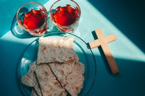 Red Wine and Bread with Cross As Christian Communion Ceremony on Blue ...