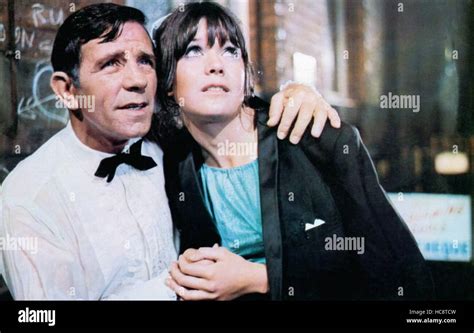 WHAT'S GOOD FOR THE GOOSE, from left, Norman Wisdom, Sally Geeson, 1969 Stock Photo - Alamy