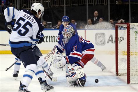 Connor Hellebuyck makes 50 saves as Jets topple Rangers - The Rink Live ...