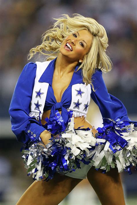 Dallas Cowboys Cheerleaders slip on swimsuits for upcoming calendar photo shoot