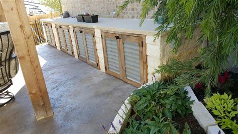 Outdoor kitchen rustic cabinet doors using barn wood frames and ...