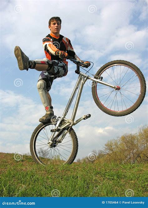 Bike trick 2 stock photo. Image of cloud, jump, control - 1705464