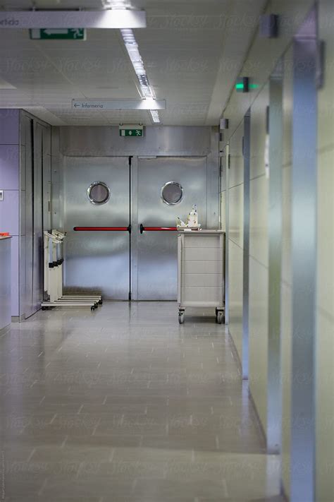 "Hospital Passage With Nobody" by Stocksy Contributor "Miquel Llonch" - Stocksy