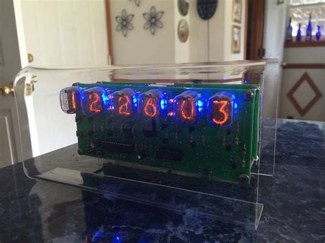 "Homemade six-digit Nixie clock, made using National nixie tubes, backlit with RGB leds, which ...