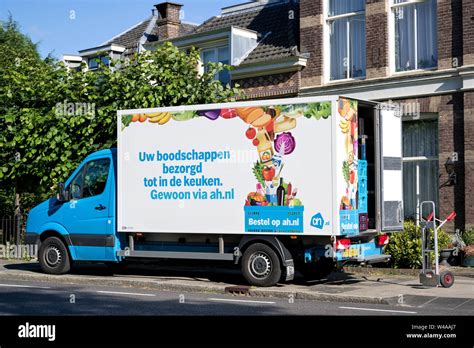 Albert Heijn delivery van. Albert Heijn is the largest Dutch supermarket chain and a key brand ...