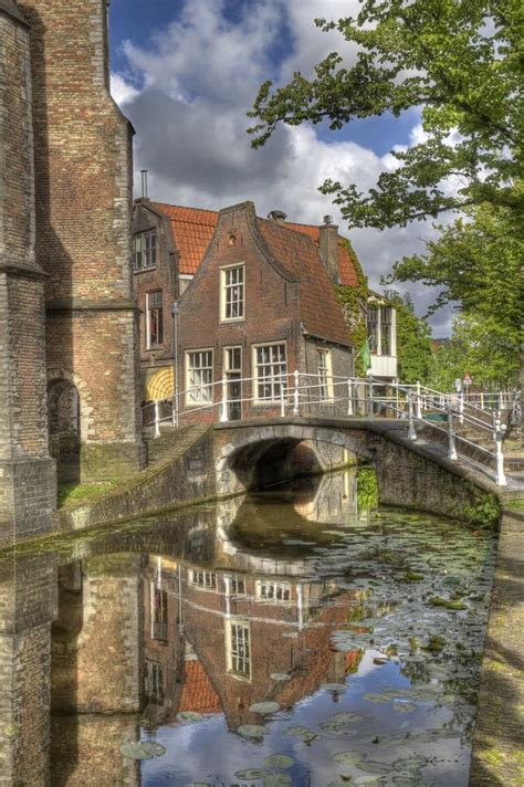 Canal in Delft, Holland stock photo. Image of europe - 141685578