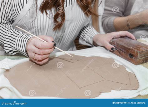 Women& X27;s Hands Knead Clay, Drawing Elements of the Product ...