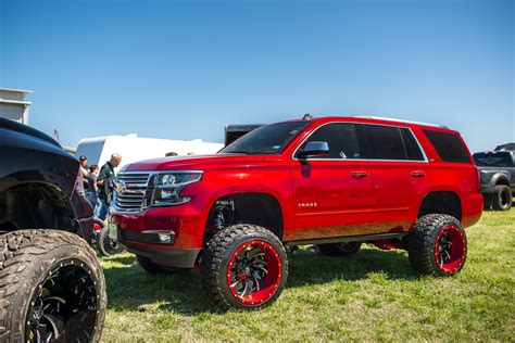 Radical Red Chevy Tahoe on Fuel Rims With Colormatched Lips — CARiD.com Gallery