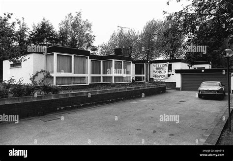 Alex Higgins World Snooker Champions house 1982 with a banner which says Welcome Home World ...