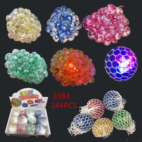 ABC Trading Wholesale. Glitter Light Up Squishy Ball 12 dz