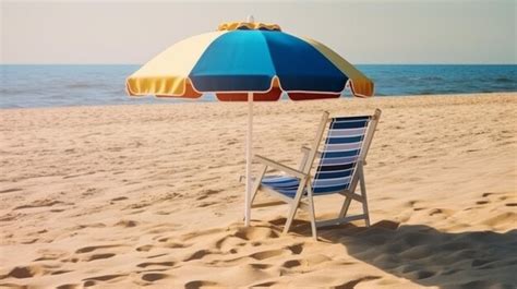 Premium Photo | Beach chair with umbrella on a beautiful white sand set ...