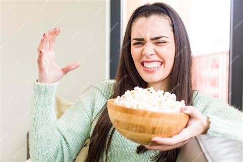 Premium Photo | Pretty young woman popcorns bowl concept house interior design