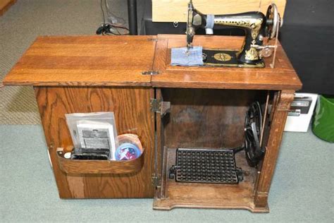 Minnesota treadle sewing machine in cabinet - aslminds