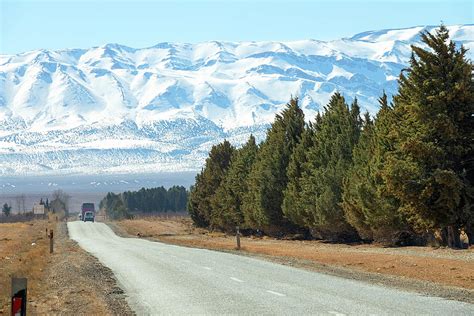 Road leading to snow Atlas mountains Photograph by Mikhail Kokhanchikov - Fine Art America