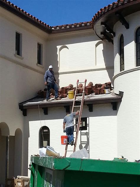 Free stock photo of improper use of a ladder, Roofers on roof without fall protection