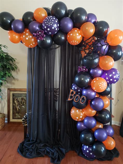 Halloween balloon garland | Birthday halloween party, Halloween themed ...