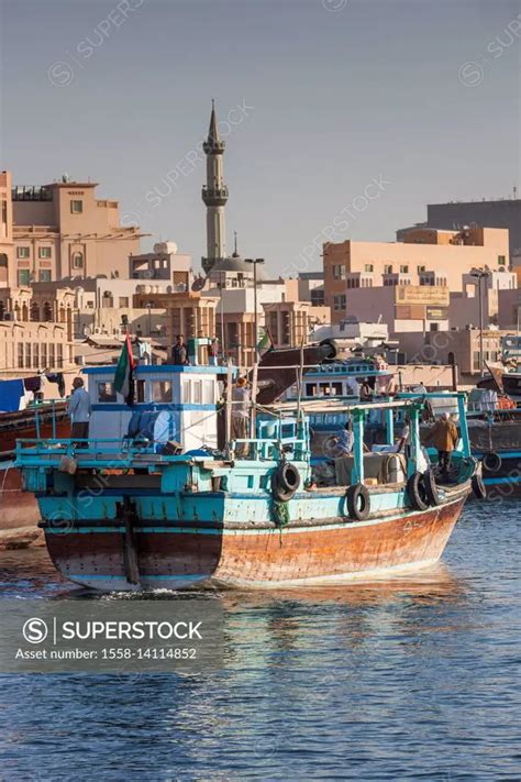 UAE, Dubai, Deira, Dhow ships on Dubai Creek - SuperStock