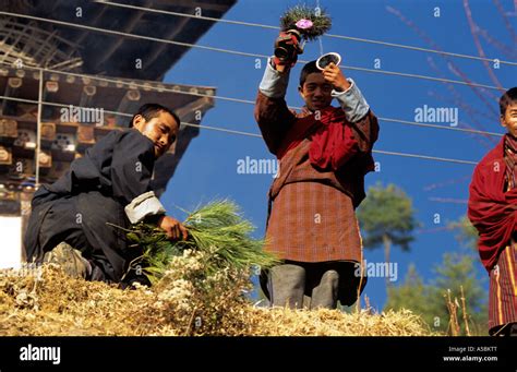 Bhutanese men performing ritual, Bhutan Stock Photo - Alamy