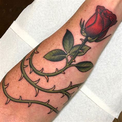 Rose and thorns tattoo | Rose thorn tattoo, Rose tattoos for men, Thorn tattoo