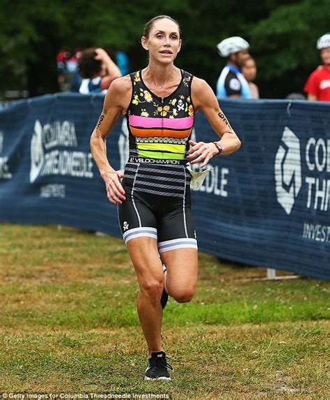 Lara Trump shows off her medal after finishing the Boston Triathlon | Daily Mail Online