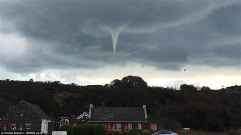 Guernsey turns into scene from Twister as tornado-like funnel appears in the sky | Daily Mail Online