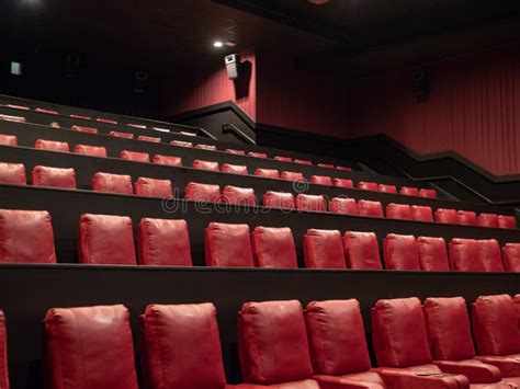 Luxury Red Movie Theater Seats in an Empty Movie Theater Stock Photo - Image of reserved, chair ...