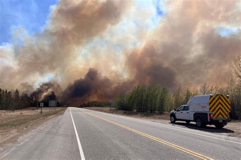 Alberta announces state of emergency as 25,000 flee out-of-control ...