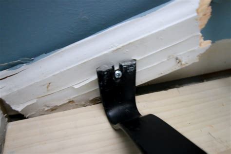 How to remove baseboards from behind tile