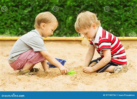 Kids Playing in Sand, Two Children Boys Outdoor Leisure in Sandbox ...