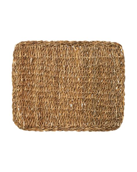 Highly textural, the Woven Seagrass Rectangle Placemat has a loose weave of natural seagrass ...