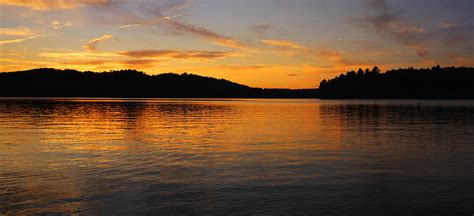 Beautiful sunset on lake Photograph by Isabel Poulin - Fine Art America