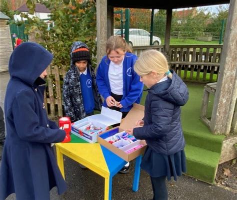 School Council selling Poppy Appeal merchandise – Crayke Primary School