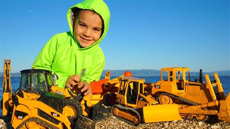 Construction Vehicles Toys | Diggers for Children | Kid Playing with Toys at the Beach - YouTube