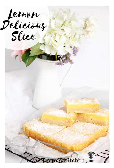 Lemon Delicious Slice is a zingy curd-like custard slice on a baked, buttery biscuit base. This ...