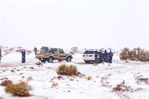 Snowfall in the northwest of Saudi Arabia covers desert in white ...