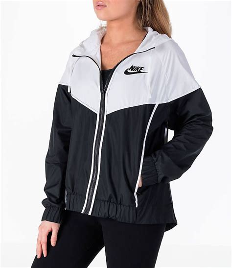 Front Three Quarter view of Women's Nike Sportswear Woven Windrunner Jacket in Black/White ...